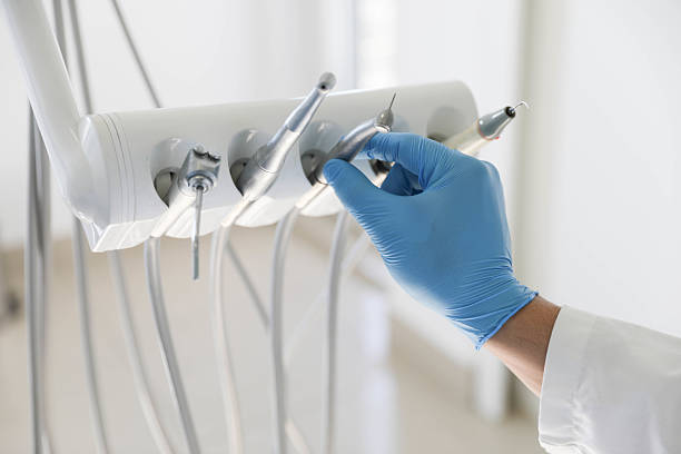 Professional Tooth Extraction technician working in Charlotte, MI